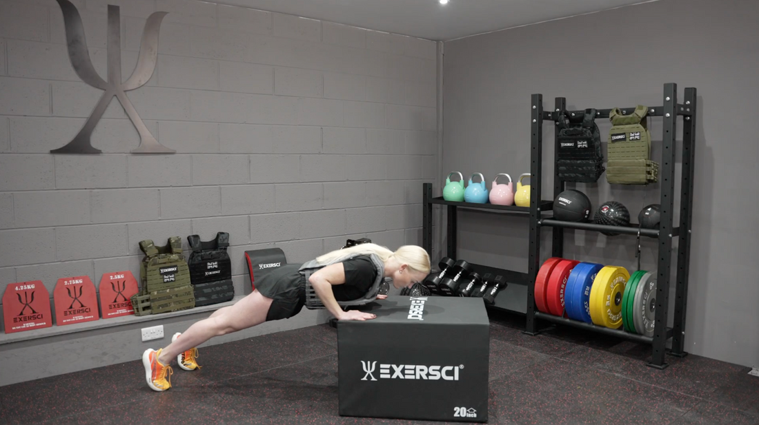 An image of a woman performing press ups with an Exersci weighted vest on to illustrate the Exersci blog post entitled 'Are Weighted Vests Good For Building Muscle?'