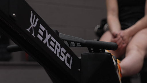 Close up image of the Exersci logo on the rower to illustrate the Exersci blog post "Why Every Home Gym Needs Endurance Machines"