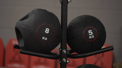 An image of the Exersci medicine ball and medicine ball with handles  to illustrate the Exersci blog post entitled '10 Medicine Ball Exercises to Build Strength and Power at Home'