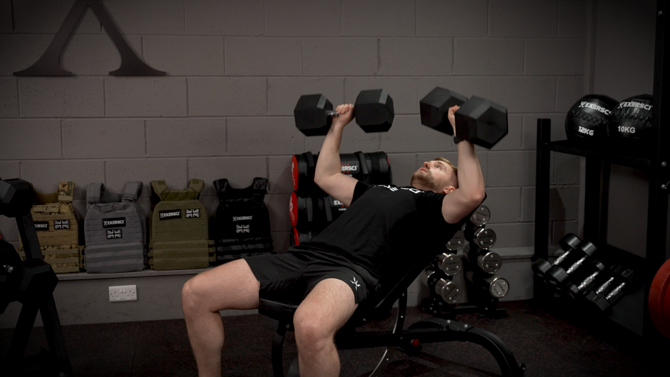An image of a man performing incline bench press with the Exersci Hex Dumbbells, to illustrate the Exersci blog post entitled 'How Do I Get The Best Out of My Dumbbell Set?'