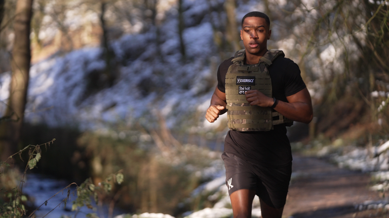 An image of a man running, with an Exersci branded weighted vest on to illistrate the Exersci blog post entitled 'Will Running With A Weighted Vest Benefit Me?'