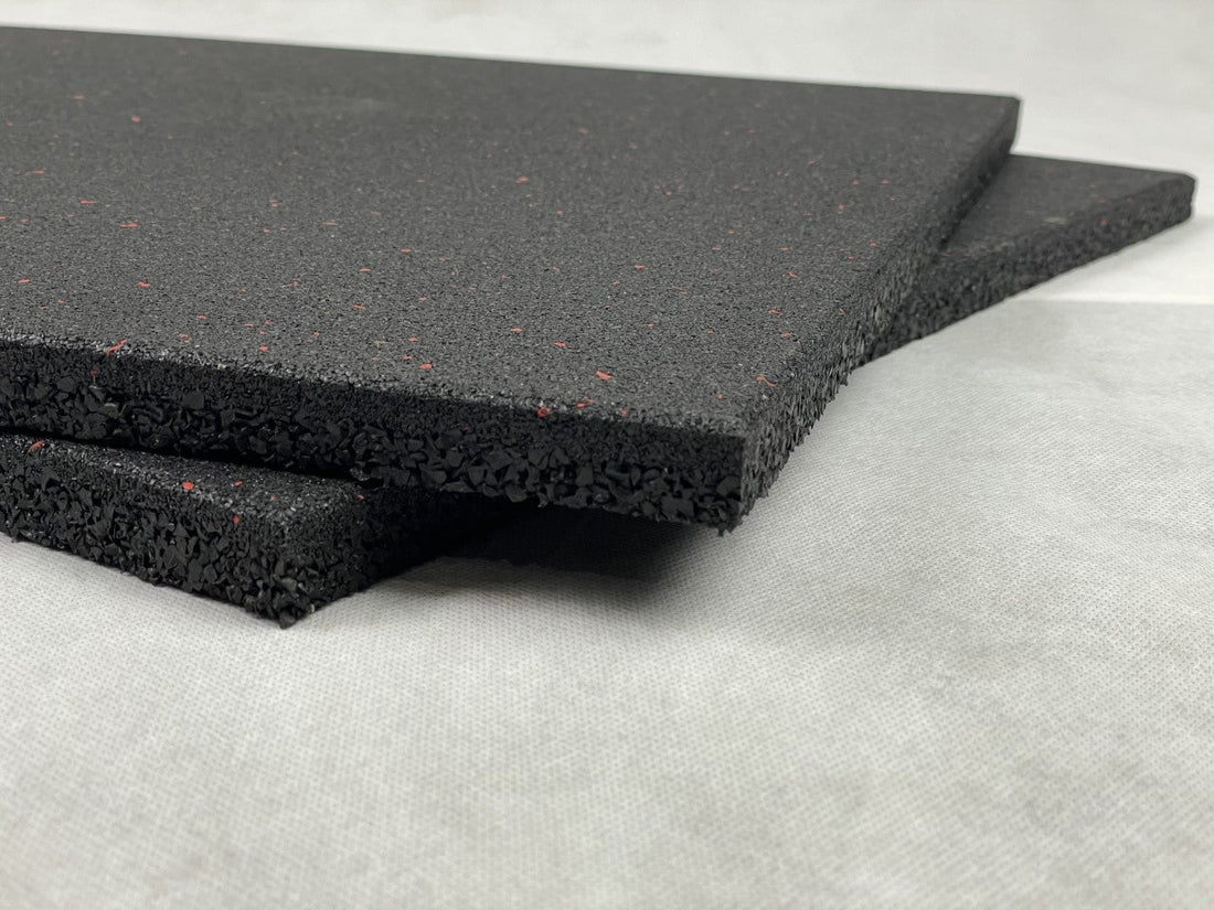 An image of the Exersci® Heavy Duty Red Speckled Rubber Floor Tiles to illustrate the Exersci blog entitled 'How to Choose the Right Gym Flooring: Thickness, Materials & Buying Guide'
