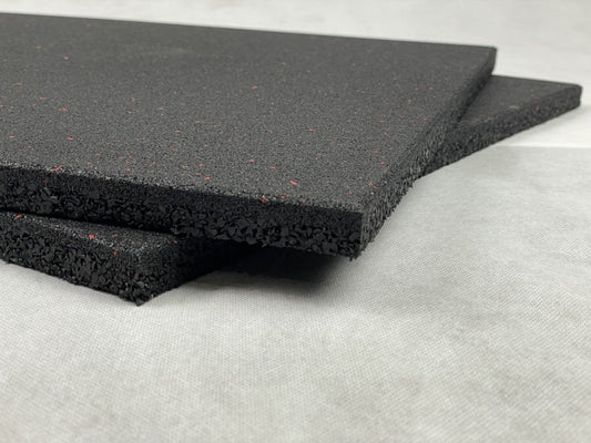 An image of the Exersci® Heavy Duty Red Speckled Rubber Floor Tiles to illustrate the Exersci blog entitled 'How to Choose the Right Gym Flooring: Thickness, Materials & Buying Guide'